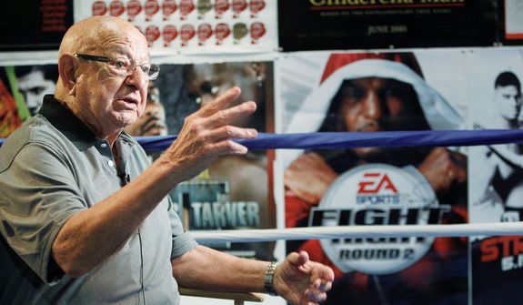 Trainer Angelo Dundee, shown in 2010, helped mold Muhammad Ali and Sugar Ray Leonard into world champions. He died Feb. 1 at age 90 in Hollywood, Fla. (Associated Press)
