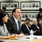 ** FILE ** South Carolina Attorney General Alan Wilson, here with Gov. Nikki Haley in June, argues in a lawsuit filed in February that the U.S. Justice Department erred in blocking the state from requiring voters to show government-issued photo identification to vote. The requirement &quot;will not disenfranchise any potential South Carolina voter,&quot; he said. (Jeremy Lock/Special to The Washington Times)