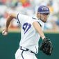 TCU starting pitcher Matt Purke winds up for a delivery against Florida State in the first inning of the opening baseball game of the NCAA College World Series, in Omaha, Neb., Saturday, June 19, 2010.(AP Photo/Nati Harnik)