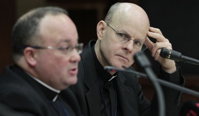 ** FILE ** Monsignor Stephen Rossetti (right), a psychologist who for a decade ran a U.S. treatment center for abusive priests, listens Feb. 8, 2012, to Monsignor Charles Scicluna during a press conference in Rome. Monsignor Scicluna spoke on the sidelines of a Vatican-backed symposium on clerical sex abuse that is designed to help bishops craft guidelines to protect children and keep pedophiles out of the priesthood. (Associated Press)