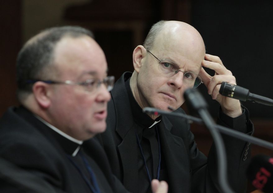** FILE ** Monsignor Stephen Rossetti (right), a psychologist who for a decade ran a U.S. treatment center for abusive priests, listens Feb. 8, 2012, to Monsignor Charles Scicluna during a press conference in Rome. Monsignor Scicluna spoke on the sidelines of a Vatican-backed symposium on clerical sex abuse that is designed to help bishops craft guidelines to protect children and keep pedophiles out of the priesthood. (Associated Press)