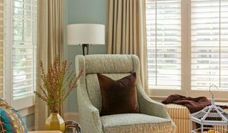 Photo by Angie Seckinger Photography
Layering window treatments, such as using plantation shutters along with draperies can increase energy efficiency as well as add style.