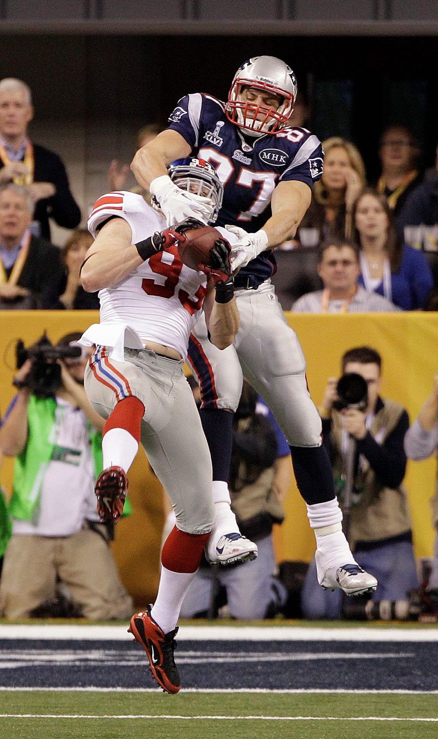 Linebacker Chase Blackburn (front), who made a critical interception in Super Bowl XLVI, will be an unrestricted free agent. (Associated Press)