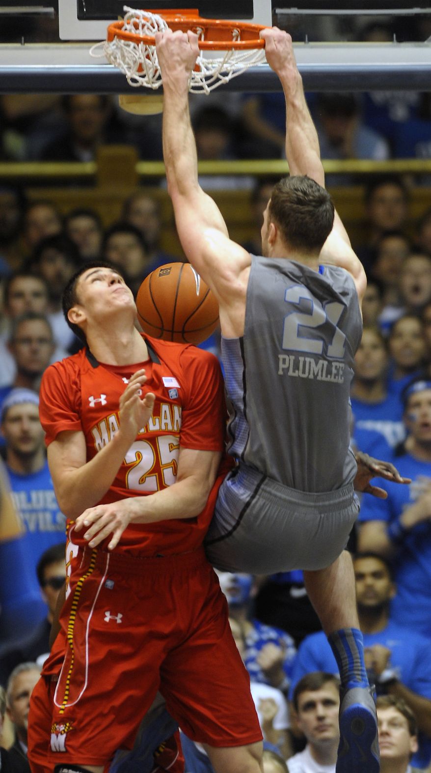 Duke's Miles Plumlee dunks over Maryland's Alex Len during the second half Saturday, Feb. 11, 2012, in Durham, N.C. Duke won 73-55. (AP Photo/Sara D. Davis)