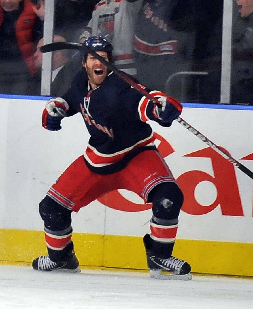 New York Rangers&#39; Brandon Prust celebrates his short-handed goal in the third period of an NHL game against the Washington Capitals in New York, Sunday, Feb. 12, 2012. (AP Photo/Newsday, David Pokress)