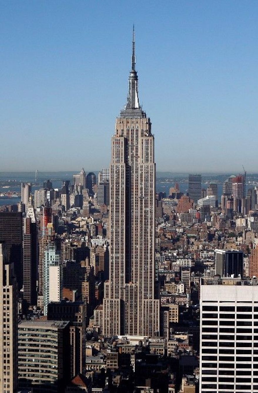 New York's Empire State Building looms as an investment opportunity. The company that runs the building is planning a stock offering, according to documents filed Monday. (Associated Press)