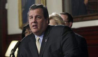 New Jersey Gov. Chris Christie answers a question in Trenton, N.J., on Wednesday, Jan. 25, 2012, about his statement the day before that he will veto a bill being considered by the Legislature to legalize gay marriage. (AP Photo/Mel Evans)


