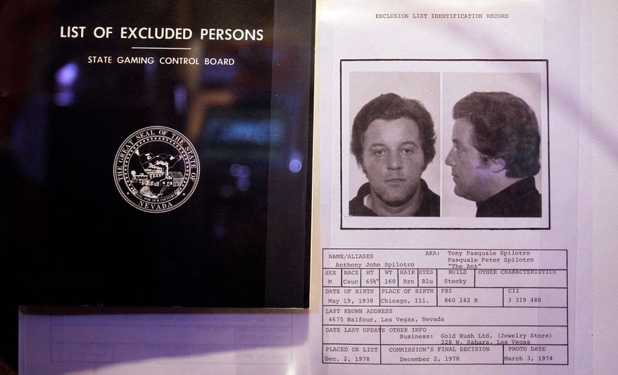 A casino black book, or list of excluded persons, on display includes Anthony Spilotro, who is seen in other parts of the museum making his First Communion. He was the model for Joe Pesci's character in Martin Scorsese's "Casino." (Associated Press)