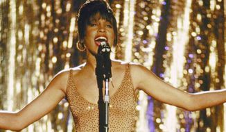 Whitney Houston starred in the 1992 film &quot;The Bodyguard,&quot; which featured Miss Houston&#x27;s biggest hit, the Dolly Parton-penned &quot;I Will Always Love You.&quot; (Warner Brothers)