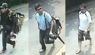 In this combination of images made from surveillance video on Tuesday, Feb. 14, 2012, three Iranian bomb-plot suspects, identified by police as (from left) Saeid Moradi, Mohammad Kharzei and Masoud Sedaghatzadeh, walk down the middle of a residential street in Bangkok after a blast at an explosives-filled house where the three were staying. (AP Photo/National Thai Police)