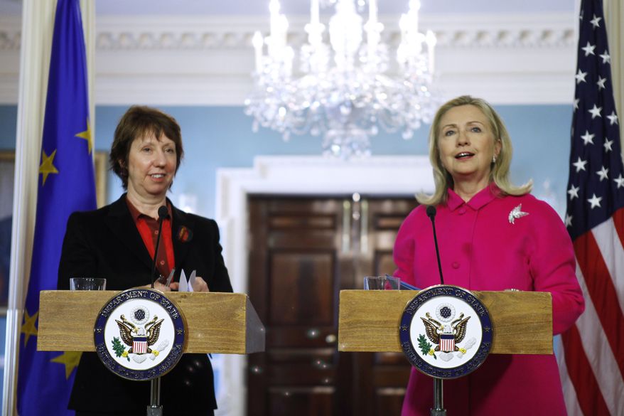 Secretary of State Hillary Rodham Clinton and EU High Representative Catherine Ashton take part in a news conference Feb. 17, 2012, at the State Department in Washington. (Associated Press)