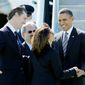 President Obama is greeted upon his arrival at San Francisco International Airport on Thursday for a series of fundraisers by (from left) California Lt. Gov. Gavin Newsom, San Francisco Mayor Ed Lee and California Attorney General Kamala Harris. (Associated Press)
