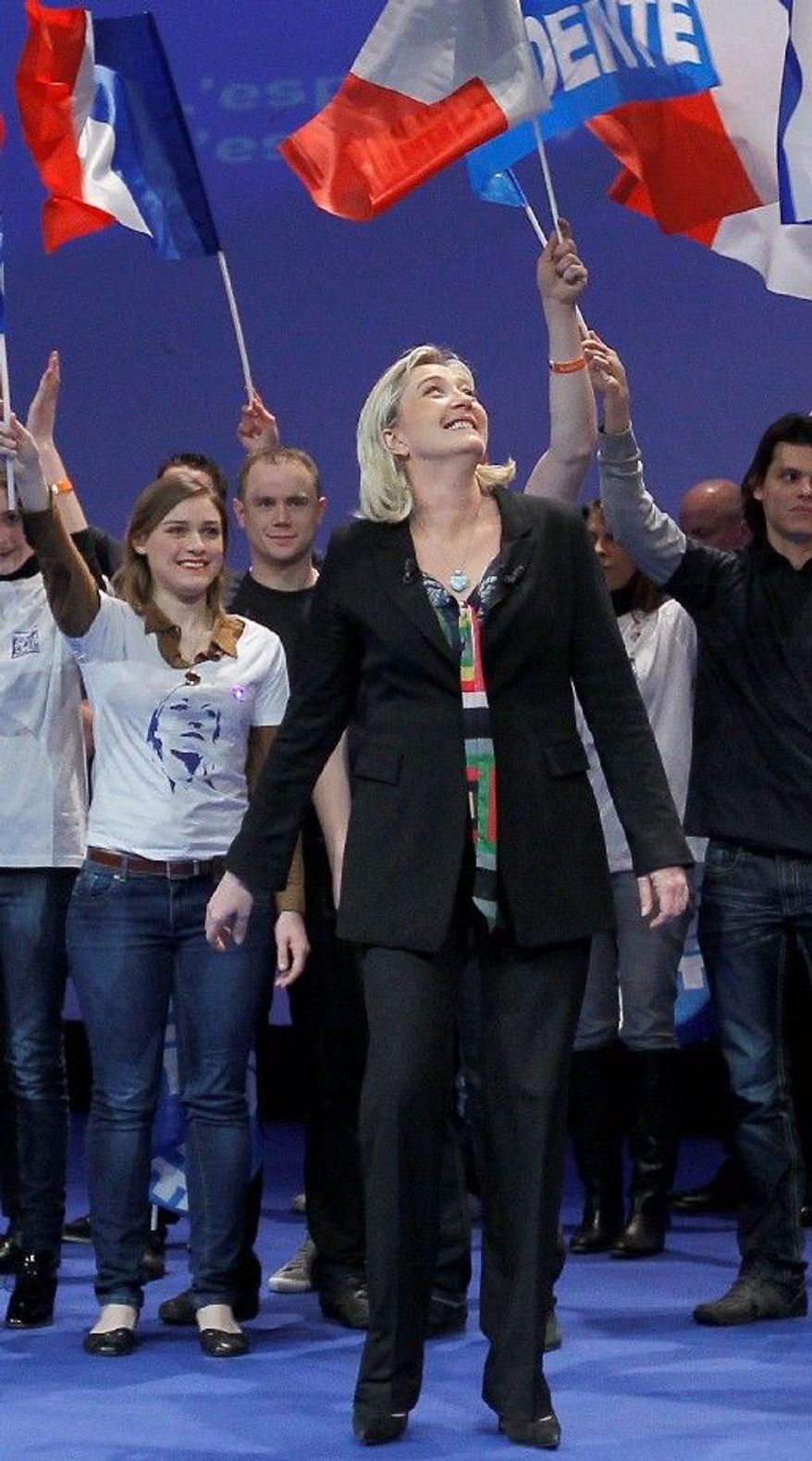 Marine Le Pen, at the National Front party's convention in Lille on Sunday, took over leadership of party last year from her father, Jean-Marie Le Pen, and is a candidate with some following in the 2012 French presidential elections. Polls show her not far behind incumbent Nicolas Sarkozy. (Associated Press)