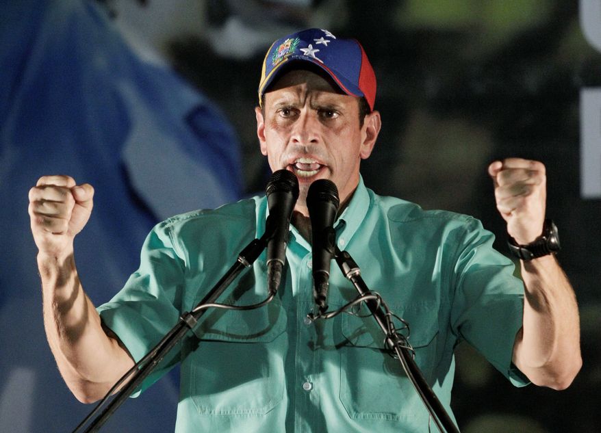 Henrique Capriles delivers a speech after winning the primary. The governor of Miranda state is out to end Hugo Chavez's presidency after 13 years. (Associated Press)