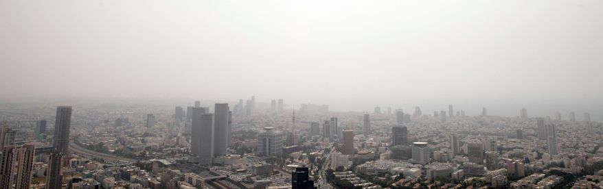 Israeli officials cite intelligence reports that Tel Aviv would be a main target of any Iranian attack. A rocket-defense system is being set up in the Mediterranean coastal city, where Israel's sprawling military headquarters sits amid office towers and tourist hotels. (Associated Press)