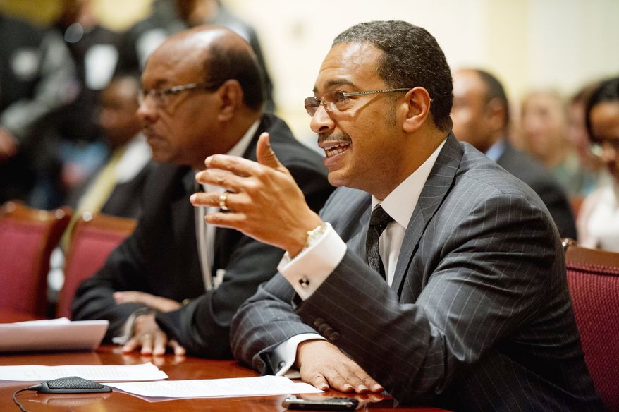 Maryland state Sen. C. Anthony Muse testifies Wednesday at a Senate Budget and Taxation Committee hearing about a proposal to add slots at the National Harbor development in Prince George's County. He recommended more planning and local input before any decision. (Andrew Harnik/The Washington Times)