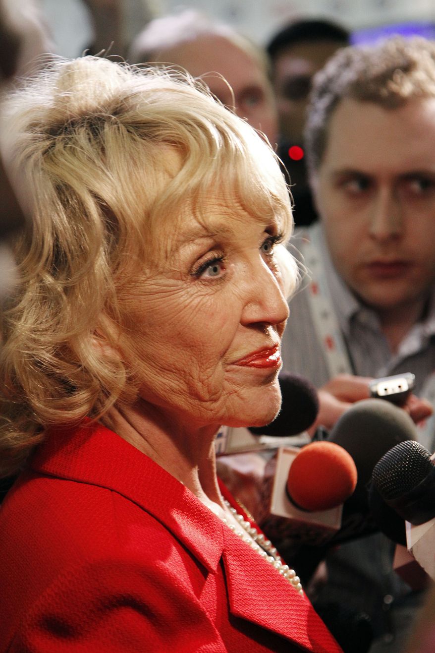 Arizona Gov. Jan Brewer speaks Feb. 22, 2012, to the media after a Republican presidential debate among the 2012 candidates in Mesa, Ariz. (Associated Press)