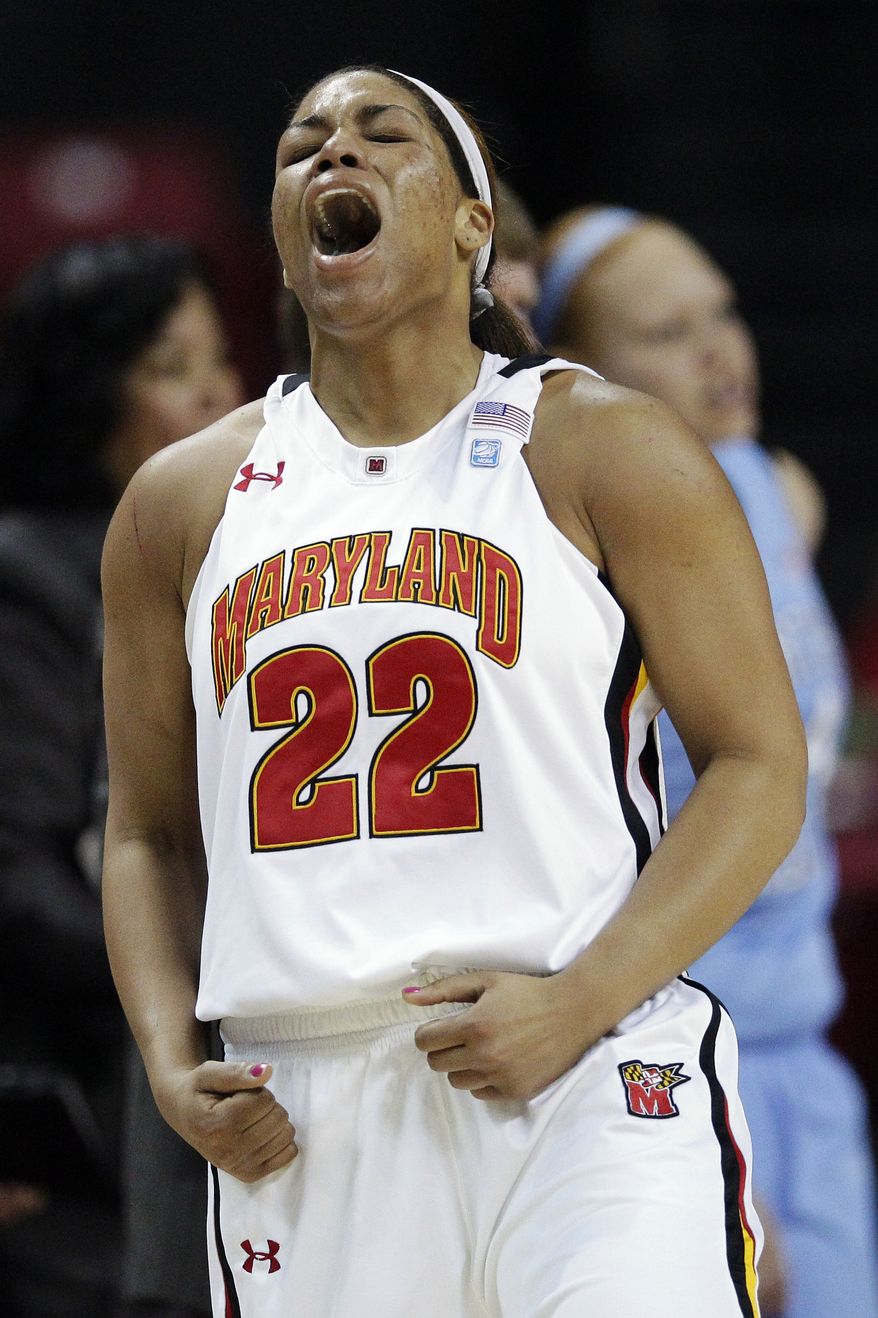 Maryland senior guard Kim Rodgers reacts after scoring a 3-pointer in the first half against North Carolina in College Park, Md., on Friday, Feb. 24, 2012. Rogers had nine points in the 84-64 win. (AP Photo/Patrick Semansky)