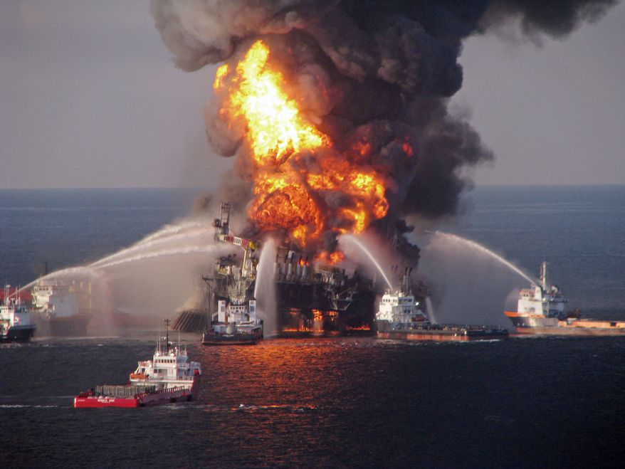 Fire boat response crews spray water on the burning remnants of BP's Deepwater Horizon offshore oil rig on Aprll 21, 2010.