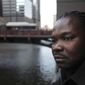Nigerian-born Charles Wiwa, 44, shown in Chicago on Thursday, Feb. 16, 2012, fled Nigeria in 1996 following a crackdown on protests against Shell’s oil operations in the Niger Delta.  (AP Photo/Charles Rex Arbogast)