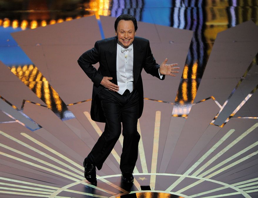 Billy Crystal performs during the 84th Academy Awards on Sunday, Feb. 26, 2012, in the Hollywood section of Los Angeles. (AP Photo/Mark J. Terrill)