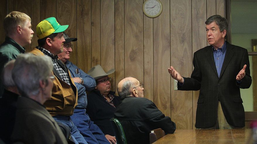 Sen. Roy Blunt, Missouri Republican, assures people about his health on Wednesday, Jan. 18, 2012, in Savannah, Mo., following a stent procedure the previous week to relieve a blockage in his heart. (AP Photo/St. Joseph News-Press, Eric Keith)