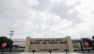 **FILE** This photo from Aug. 9, 2011, shows the closed gates at Dover Air Force Base, Del. (Associated Press)