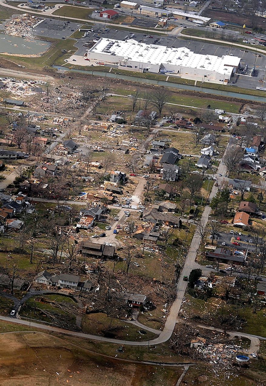 This aerial photo shows a path of damage stretching west from the backside of a Wal-Mart Supercenter to the east in Harrisburg, Ill., after a severe storm hit Wednesday, Feb. 29, 2012. Several deaths have been reported in Harrisburg and left the city's medical center scrambling to treat an influx of injured, the hospital's top administrator said. (AP Photo/The Southern, Steve Jahnke)