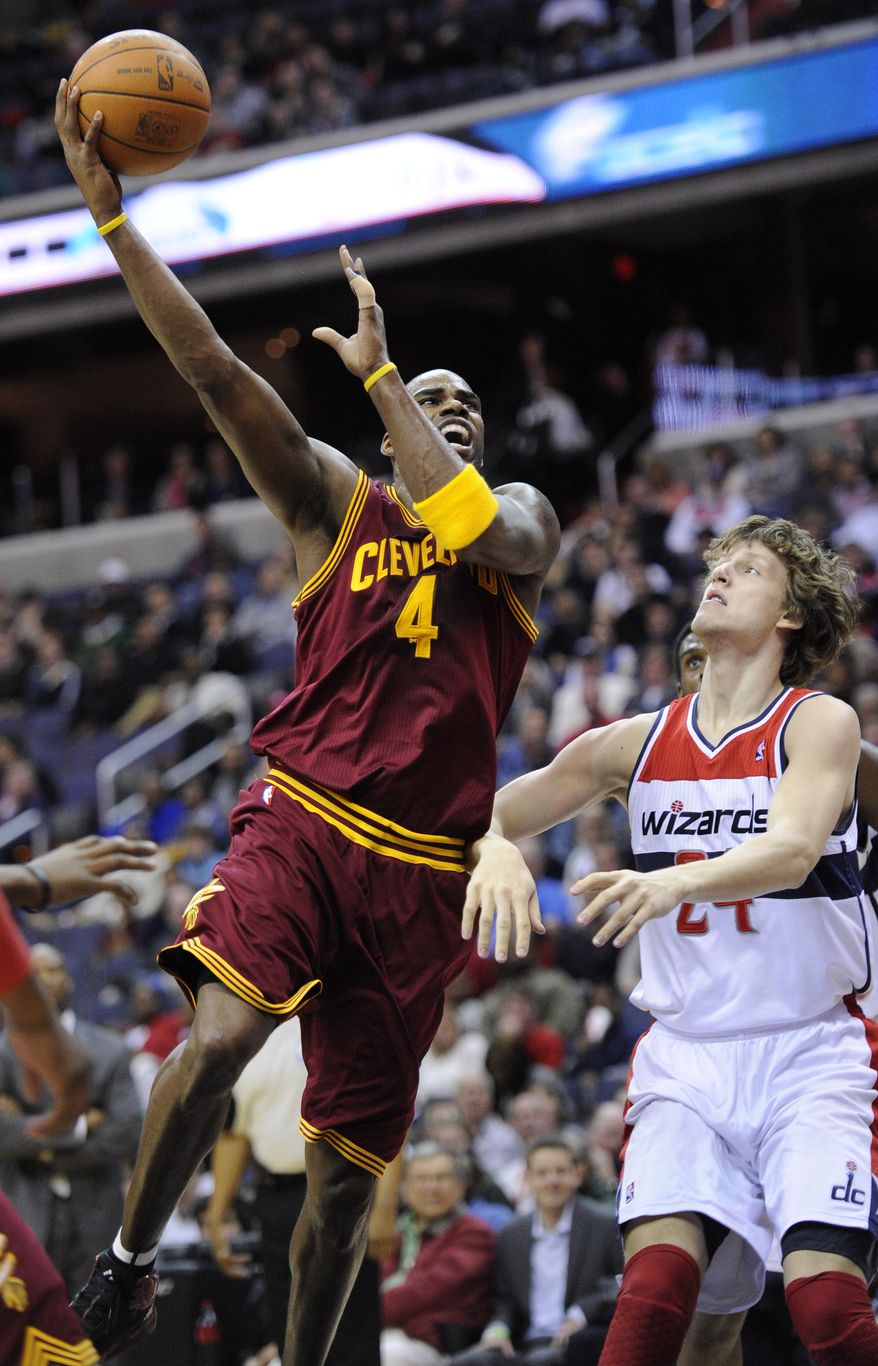 Cleveland Cavaliers forward Antawn Jamison goes to the basket against Washington Wizards forward Jan Vesely during the first half Saturday, March 3, 2012, in Washington. (AP Photo/Nick Wass)