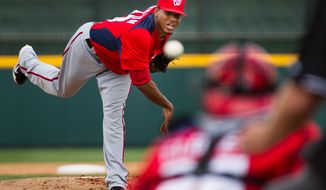 Washington Nationals pitcher Edwin Jackson (33) pitches in the first inning as the Washington Nationals play the Houston Astros during spring training at the Osceola County Stadium, Kissimmee, Fla., Saturday, March 3, 2012. (Andrew Harnik/The Washington Times)