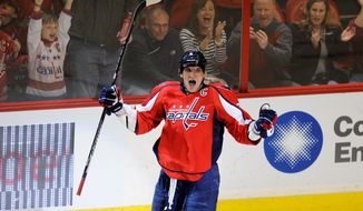 Left wing Alex Ovechkin, celebrating a goal Feb. 24 against Montreal, is the last Capital to score since Feb. 28. His overtime goal beat the New York Islanders 3-2. (Associated Press)