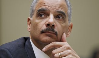 **FILE** Attorney General Eric Holder testifies Feb. 2, 2012, on Capitol Hill. (Associated Press)