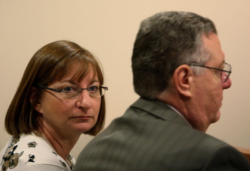 Jane and Joe Clementi, Tyler Clementi's parents, wait for the start of Dharun Ravi's trial at the Middlesex County Courthouse in New Brunswick, N.J., on Friday, March 2, 2012. (AP Photo/Home News Tribune, Mark R. Sullivan, Pool)