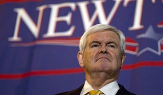 Former House Speaker Newt Gingrich pauses during a presidential campaign stop at Food City in Chattanooga, Tenn., on Monday, March 5, 2012. (AP Photo/Evan Vucci)

