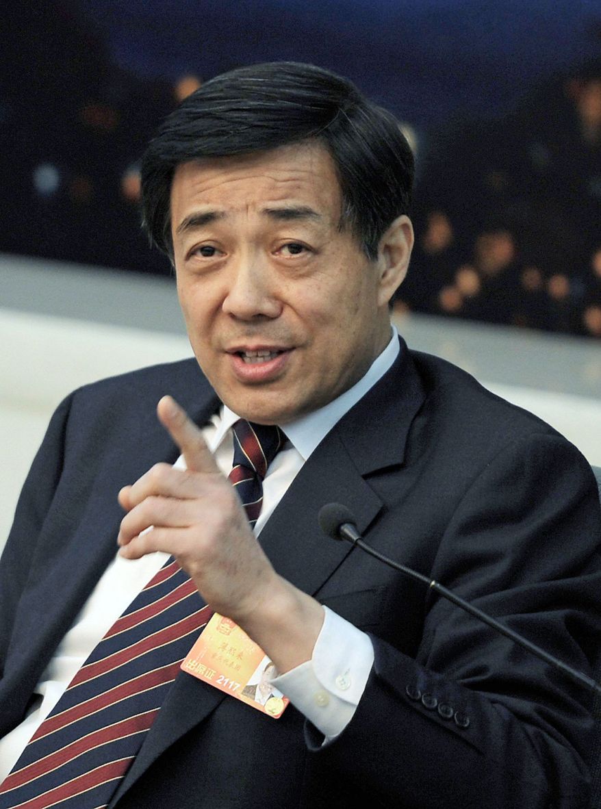 Bo Xilai, party secretary of the western city of Chongqing, speaks during a news conference after a Chongqing delegation meeting of the National People's Congress at the Great Hall of the People in Beijing, Saturday, March 6, 2010. Bo is the rare official in China with a strong public personality, which could help him with media and popular attention but might not help him within the upper levels of the conservative, ruling Communist Party. (AP Photo/Andy Wong)