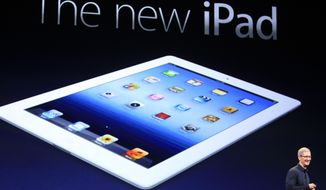 Apple CEO Tim Cook introduces the new iPad during an event in San Francisco on Wednesday, March 7, 2012. The new model features a faster processor and a screen that&#39;s even sharper than a high-definition television&#39;s. (AP Photo/Jeff Chiu)