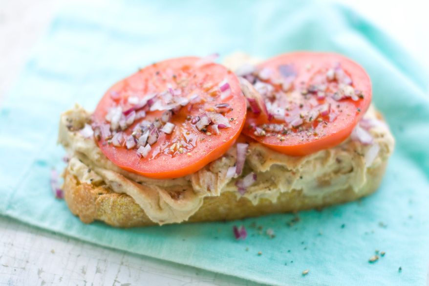 The recipe for this dish pairs pancetta with hummus on sourdough bread with a topping of tomatoes, red onions and balsamic vinegar. Pancetta, a close relative to American bacon, is a must-have for authentic carbonara. Browning small chunks of it is a classic start to many Italian recipes. (Associated Press)