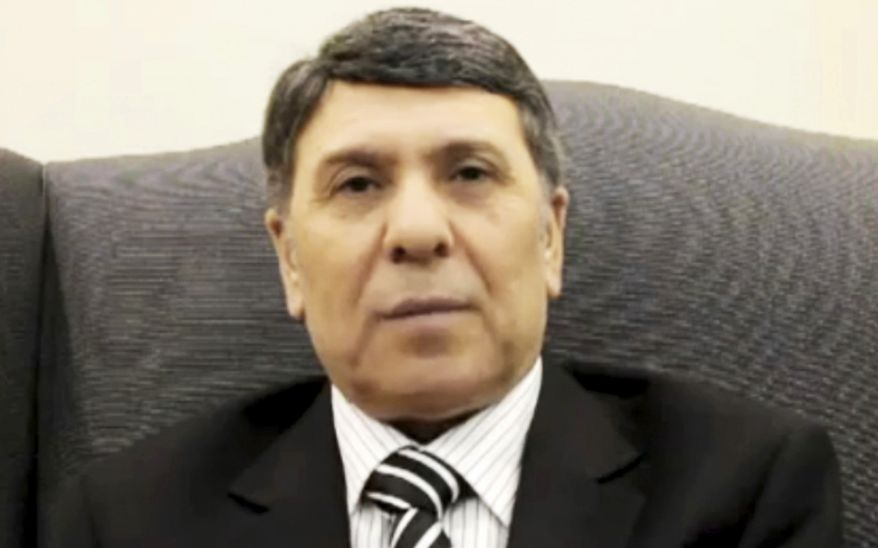 This image made from amateur video and released by Aljizahnews on Thursday, March 8, 2012, purports to show Abdo Husameddine, a deputy in Syria's Oil Ministry, at an unidentified location. (AP Photo/Aljizahnews via APTN)