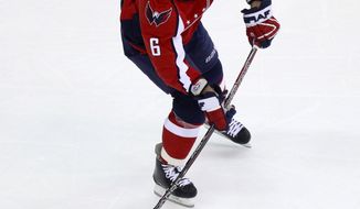 The Washington Capitals sent defenseman Dennis Wideman to the Calgary Flames in exchange for a fifth-round pick and the rights to impending free agent defenseman Jordan Henry. (AP Photo/Haraz N. Ghanbari)