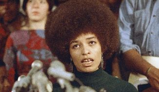 Angela Davis, seen here in February 1972 being freed on bail while awaiting trial for murder in the furnishing of guns used in a shootout at the Marin, Calif., County courthouse, was ultimately acquitted, despite her proven ownership of the murder weapons. (Associated Press)