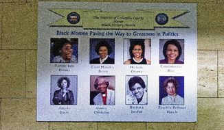 A poster hanging on the wall in the D.C. Superior Court building in Washington, D.C. shows &quot;Black Women Paving the Way to Greatness in Politics.&quot; It curiously includes Ms. Davis. (The Washington Times)