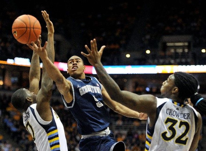 Georgetown sophomore Markel Starks, going to the basket against Marquette, is one of 10 underclassmen on the Hoyas' roster. (Associated Press)