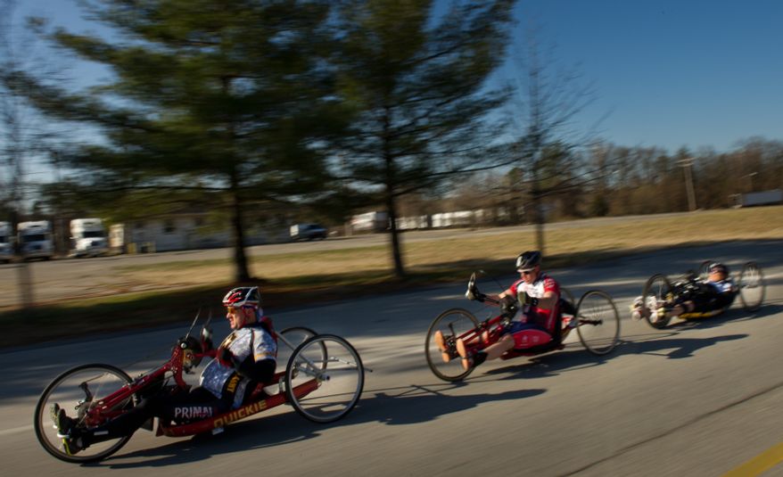 Wounded soldiers and Army veterans from across the United States compete in a hand bike race in the Army Warrior Games clinics for a chance at a spot on the Army Warrior Games team, Fort Meade, Md., Sunday, March 11, 2012. The 2012 Warrior Games, held April 30th - May 5th in Colorado Springs, Colo., features representatives from Army, Navy, Air Force, Marines and Special Operations and will compete for gold metals in archery, cycling, wheelchair basketball, shooting, swimming, track and field, and sitting volleyball. (Andrew Harnik/The Washington Times)