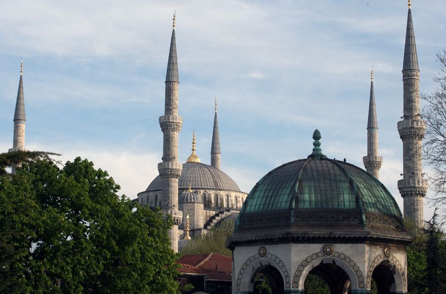 The Sultan Ahmed Mosque (top), also called the Blue Mosque, represents the mournful character of Istanbul epitomized by Nobel laureate Orhan Pamuk. The faded facades in the old districts are now surrounded by a striking frenzy of expansion that threatens the city's heritage, environment and identity. (Associated Press)