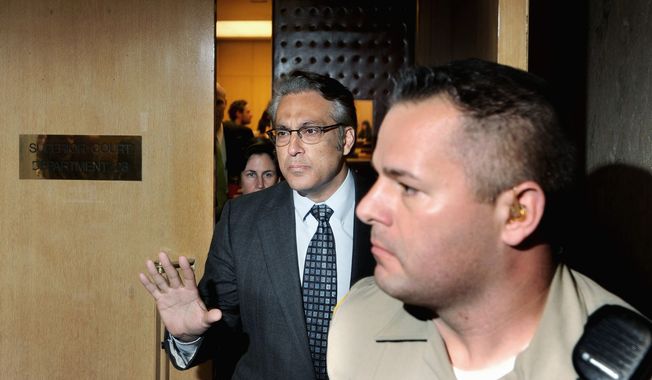 San Francisco Sheriff Ross Mirkarimi (left) leaves court Monday after pleading guilty to a misdemeanor charge of false imprisonment. He could still be ousted by the city&#x27;s Board of Supervisors. (Associated Press)