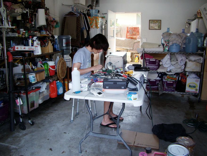 Jordi Munoz works on a drone in his garage. (Courtesy of Jordi Munoz)