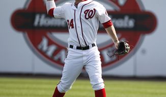 Washington Nationals&#39; Bryce Harper made his spring training debut in center field against the Atlanta Braves on Wednesday.  (AP Photo/Julio Cortez)