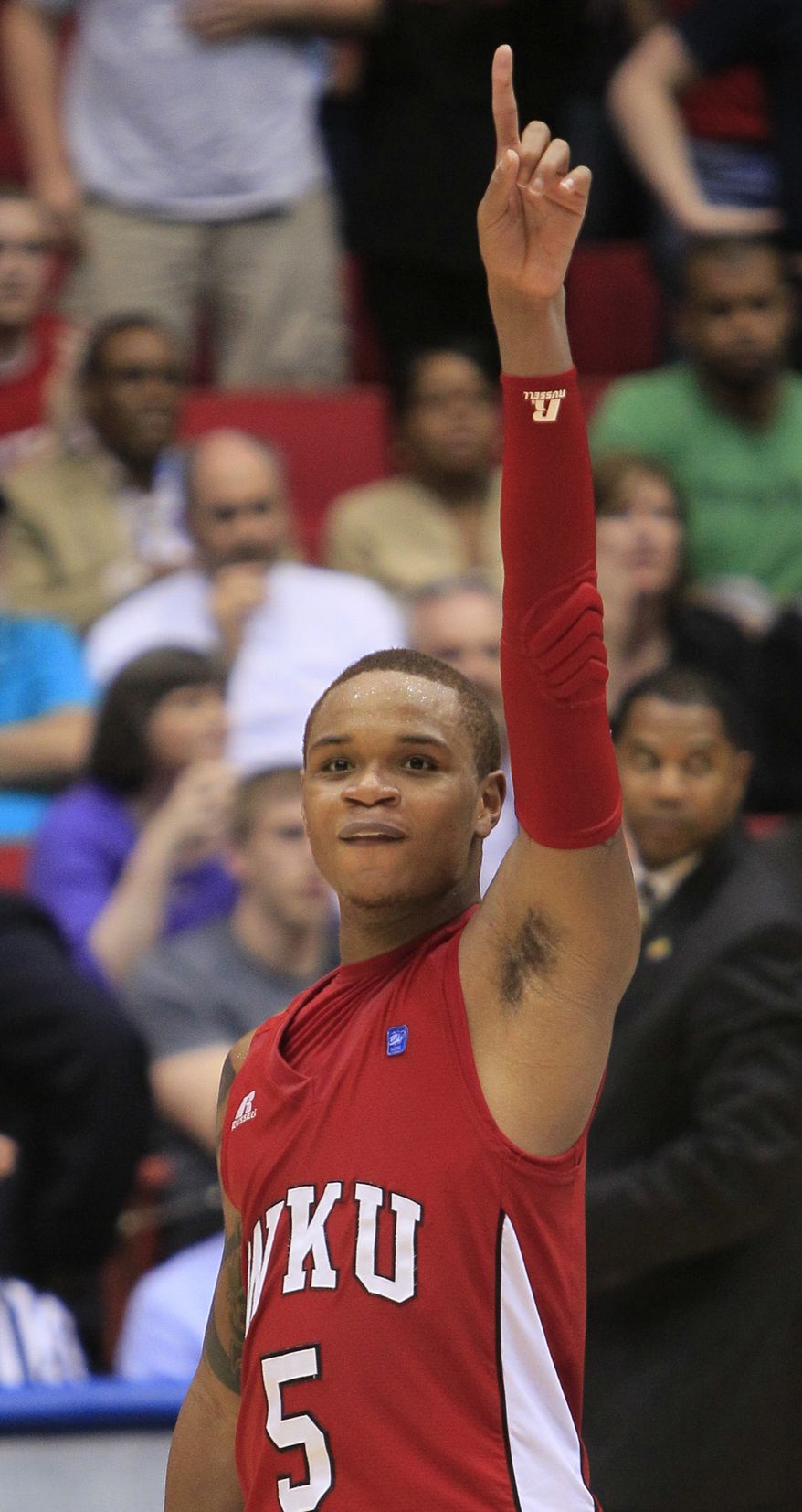 Western Kentucky guard Derrick Gordon celebrates after his team defeated Mississippi Valley State 59-58 in the opening game of the NCAA men's college basketball tournament, Tuesday, March 13, 2012, in Dayton, Ohio. Gordon led the Hilltoppers with 11 points and 12 rebounds. (AP Photo/Al Behrman)