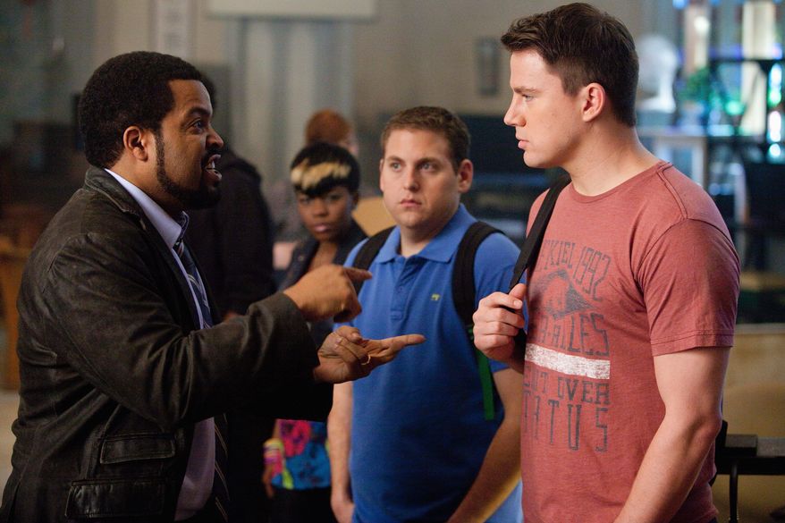 Ice Cube (left) is the surly commander of the Jump Street police division, which sends Jonah Hill (center) and Channing Tatum undercover in high school to find youth crime. (Columbia Pictures-Sony via Associated Press)