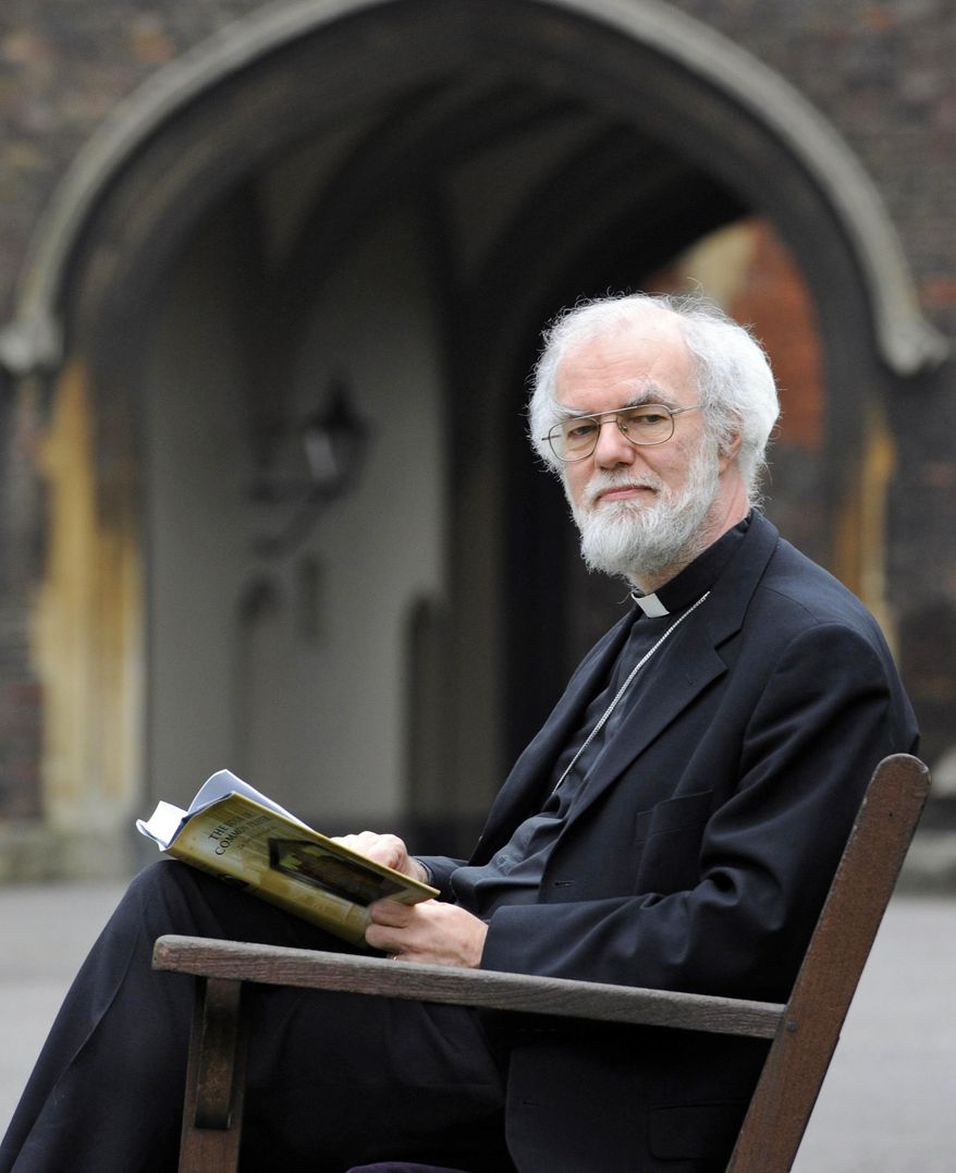 Archbishop of Canterbury Rowan Williams reads the Book of Common Prayer in the grounds of Lambeth Palace, in London on March 16, 2012. Williams says he is stepping down at the end of the year, closing a tumultuous decade as leader of a global Anglican communion sharply divided on issues of sexuality and gender. (Associated Press/PA Wire)